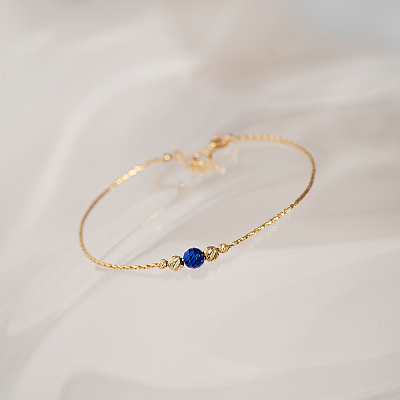 Золотий браслет Orbit з синьою намистиною (арт. 324942жс)