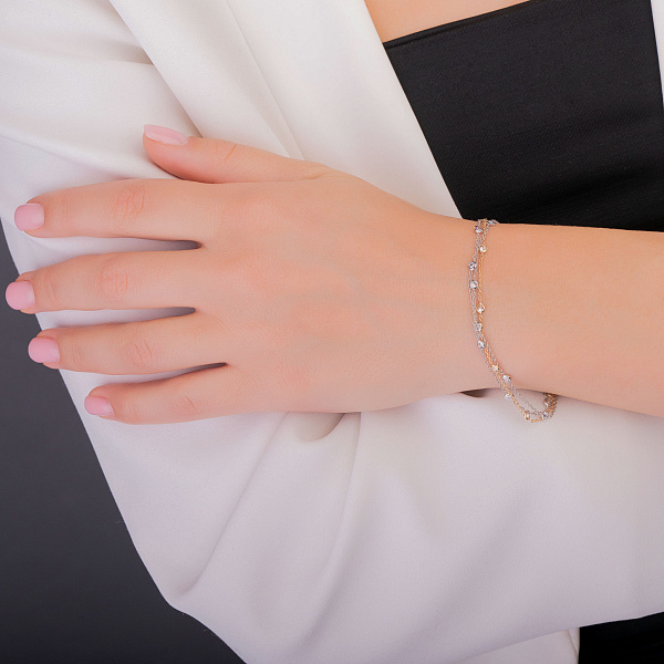 Браслет з жовтого і білого золота з фіанітами (арт. 326543жб) – зображення 3